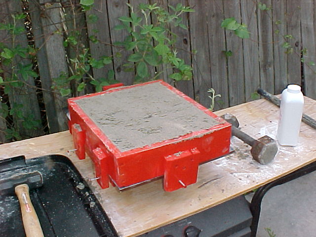 sand is rammed hard against patterns and scraped off  flat.jpg